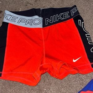 red nike pros